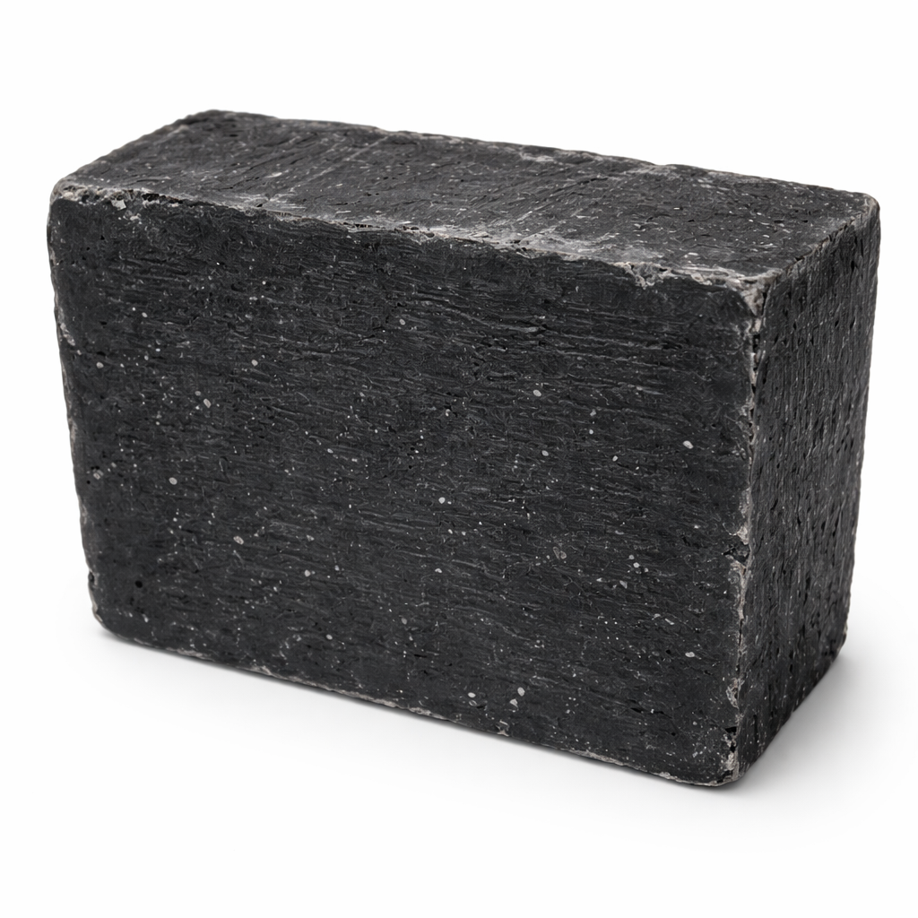 Black soap bar on a white background