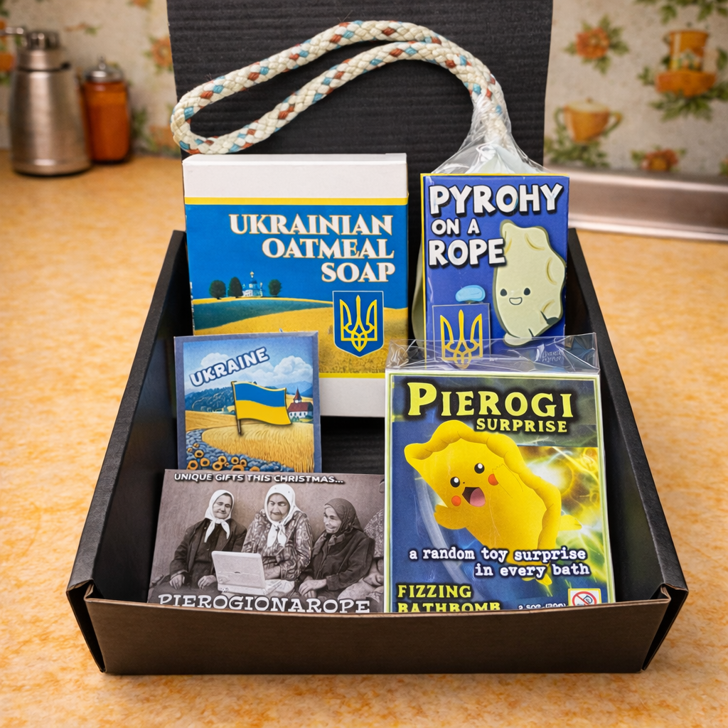 Box with Ukrainian-themed products including soap and toys on a countertop.