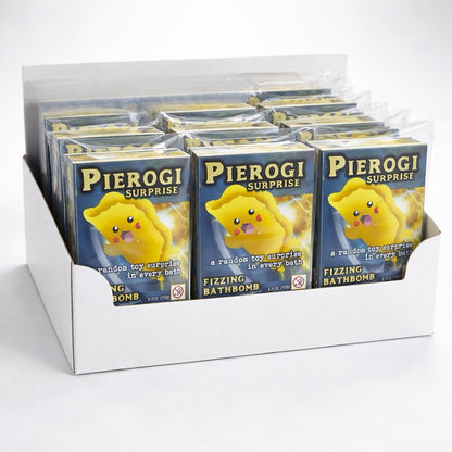 Display of Pierogi Surprise bathbomb packages with yellow toy figures on a white background