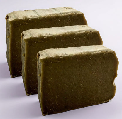 3 bars of dark green soap on a white background