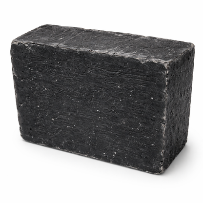 Black soap bar on a white background