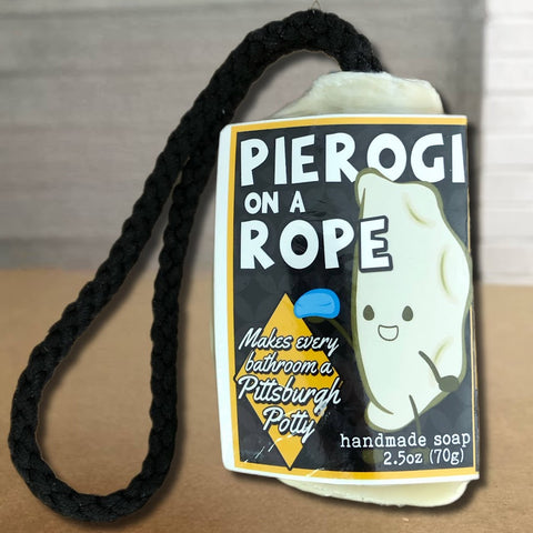 Embrace the spirit of Pittsburgh and the Steelers with our exceptional soap, inspired by the iconic pierogi. This handcrafted soap pays homage to the rich culture of Pittsburgh, a city renowned for its steel heritage and football passion. Picture a soap crafted in the shape of a pierogi, suspended elegantly on a rope, reminiscent of Pittsburgh's industrial roots