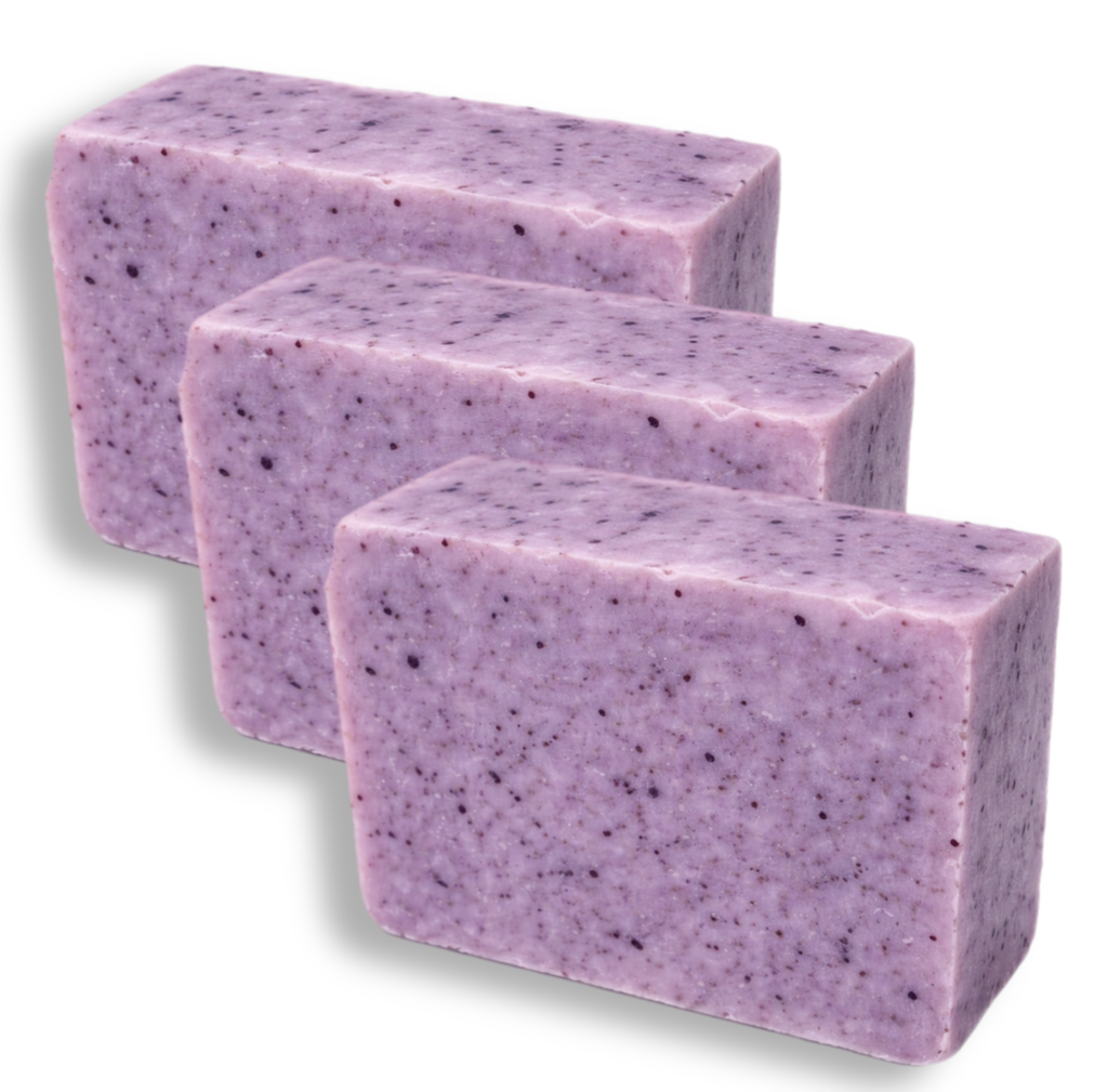 Three bars of purple soap with speckles on a white background