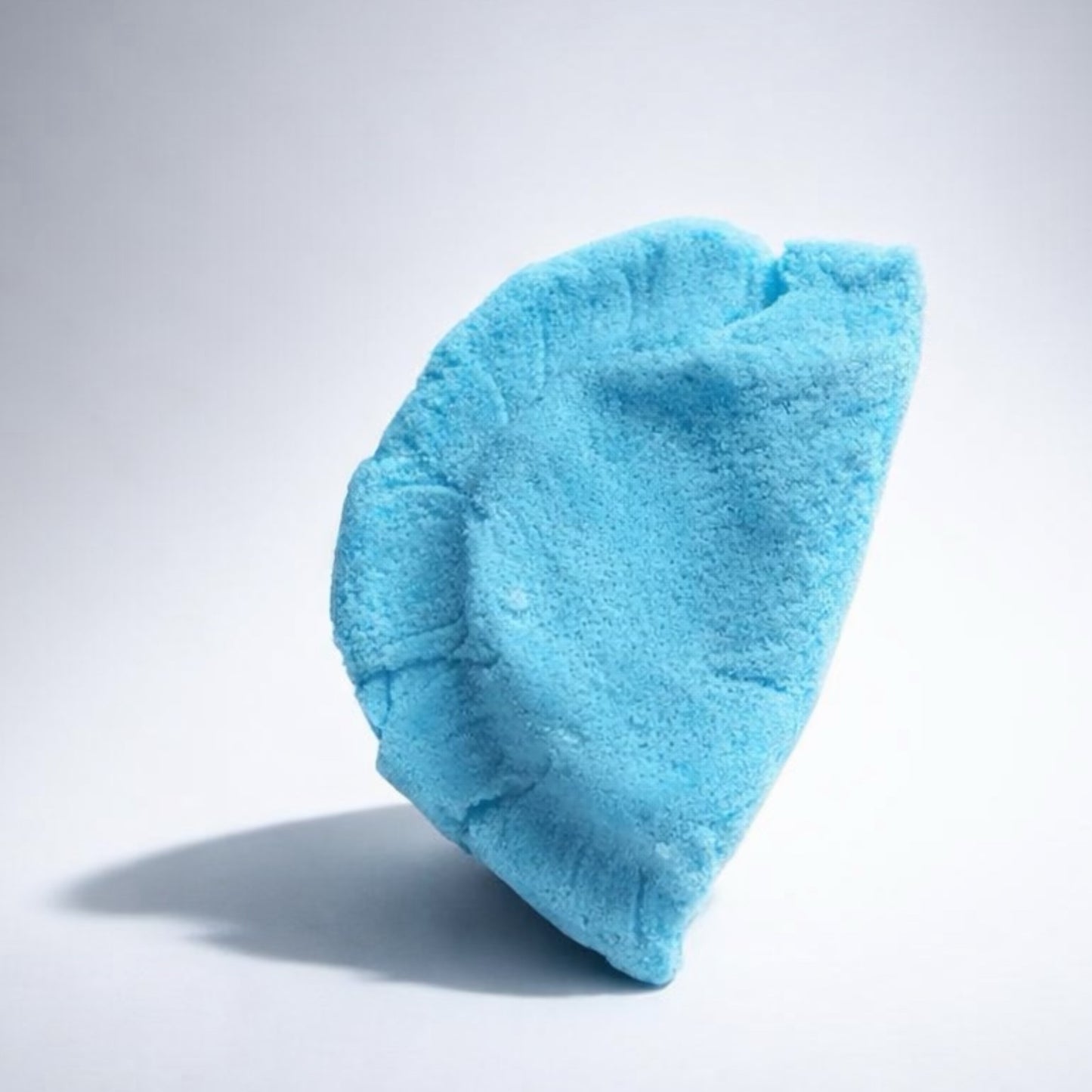 Blue pierogi bath bomb  on a white background