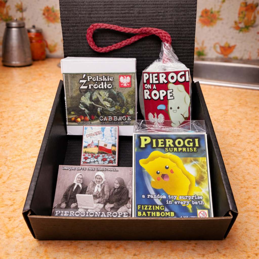 Box with pierogi-themed products including books and a bath bomb on a kitchen counter.
