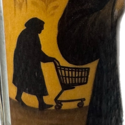 Silhouette of a babushka person pushing a shopping cart on a yellow background
